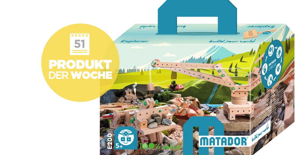 Holzbauset Kranarm Konstruktion Steinlandschaft Verpackung mit Tragegriff Aufschrift 51 PRODUKT DER WOCHE E200 5+ 100% Disynature MATADOR build your world Matador Circle