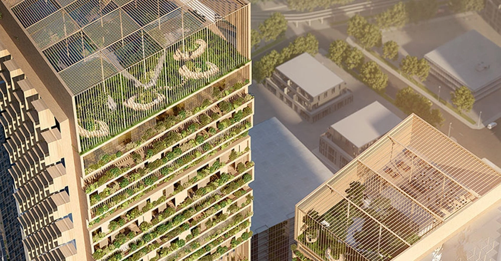 Hochhäuser mit üppigen, begrünten Terrassen und offenen Gitterstrukturen auf den Dächern in einer städtischen Umgebung mit umliegenden Gebäuden und Straßen.