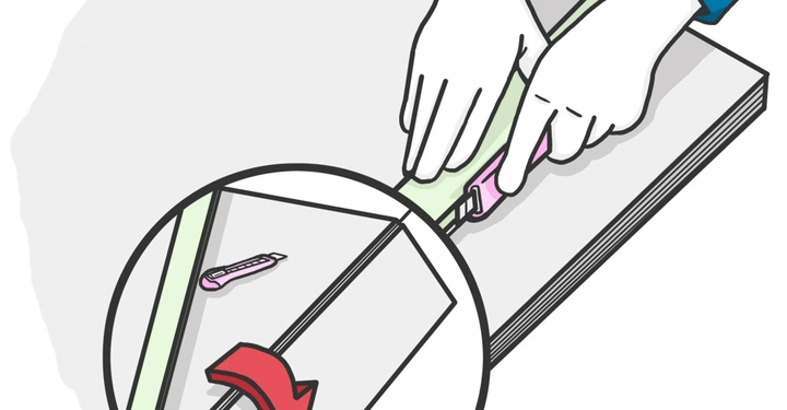 Hände schneiden mit einem Messer ein grünes Band auf einer grauen Oberfläche. Vergrößerter Bereich zeigt das Messer und den Schnitt deutlich.