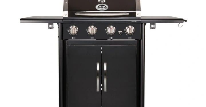 Galerie-Bild 9: Schwarzer Gasgrill mit Schranktüren und vier Drehknöpfen steht still auf Rädern im Innenbereich Eurochef auf der Haube