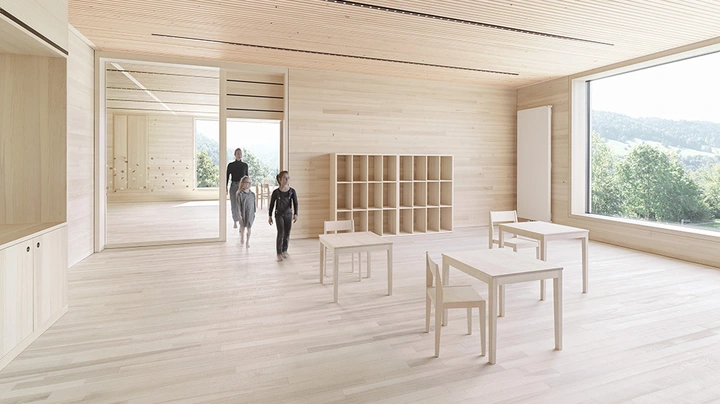 Galerie-Bild 4: Innenaufnahme eines großen Raumes ganz aus Holz mit riesiger Fensterfront mit Blick ins Grüne.