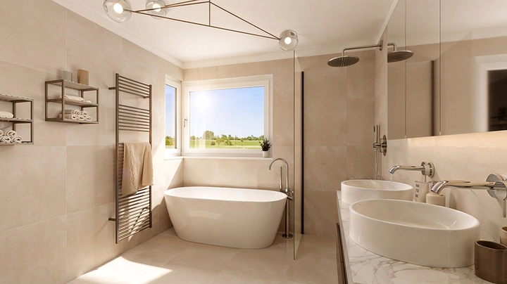 Galerie-Bild 2: Sunset Fields Laxenburg Badezimmer mit Badewanne und zwei Waschbecken in hellem Raum